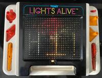 Tomy Lights Alive